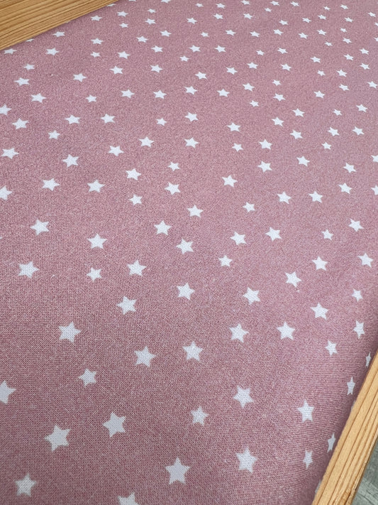 Tela popelin rosa con estrellas